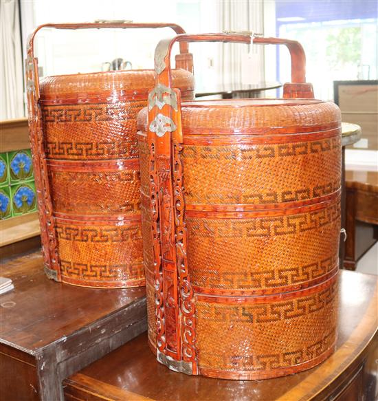 A pair of Chinese metal mounted red lacquer sectional picnic boxes W.48cm